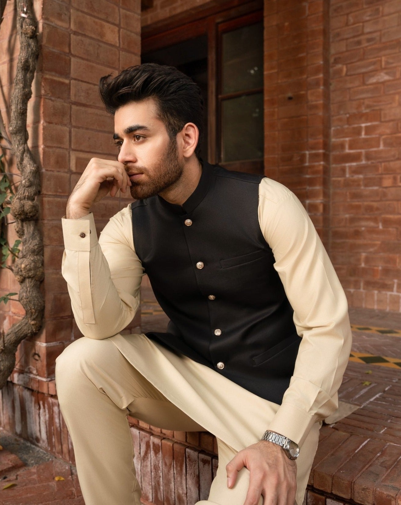 Black waistcoat on Ivory shalwar kameez for men