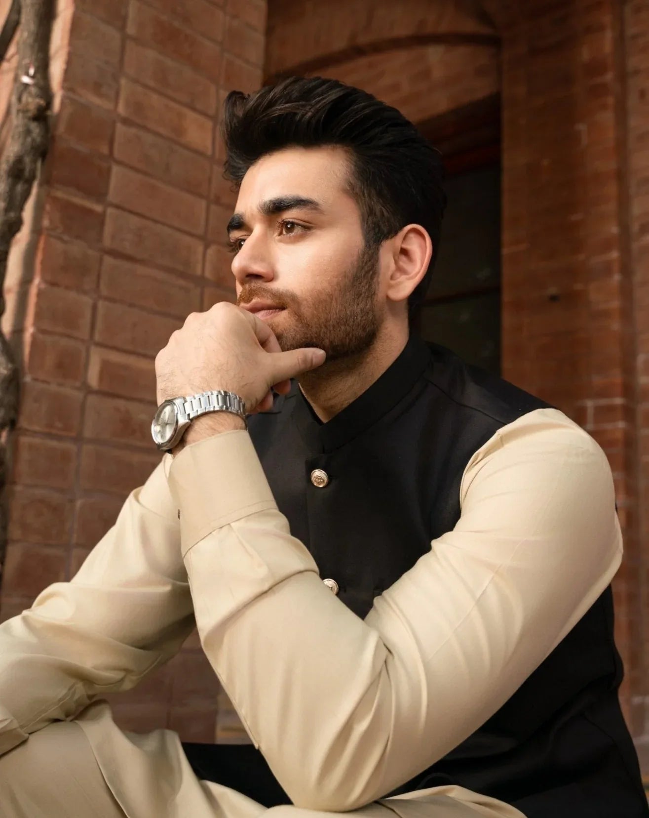 Black on IaBlack waistcoat on Ivory shalwar kameez for menuraqsh Man