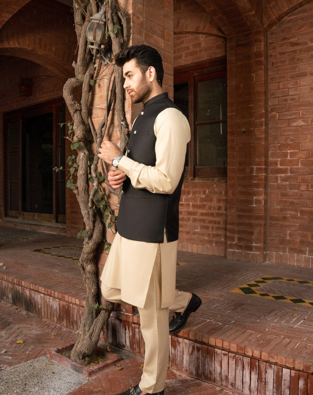 Black waistcoat on Ivory shalwar kameez for men