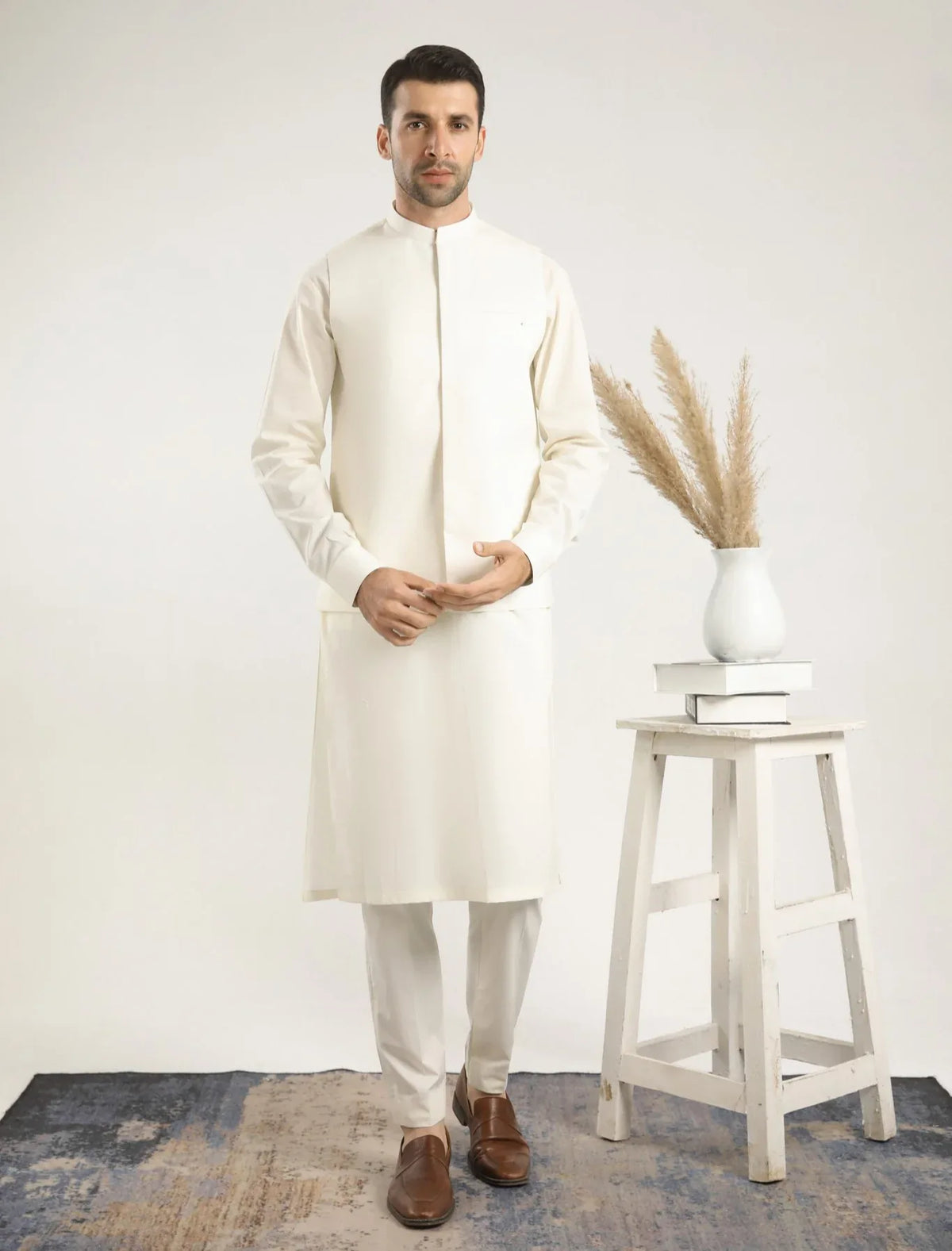 Muraqsh Ready To Wear Embroidered Bosky Men Bosky White Kurta Trouser with Cross Stitched Waistcoat  MUR-BWKTW - Summer Collection